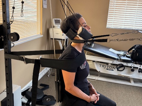 Patient in Pope two-way cervical traction